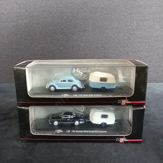 2 1:87 SCALE MODELS, VOLKSWAGEN BEETLE AND KARMANN GHIA TOWING CARAVANS, BOXED