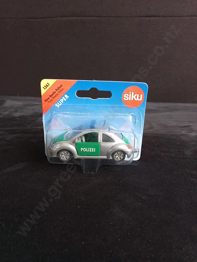 3 1:64 SCALE SIKU VOLKSWAGEN BEETLE AND BEETLE + CARAVAN MODELS, BOXED Image 1++