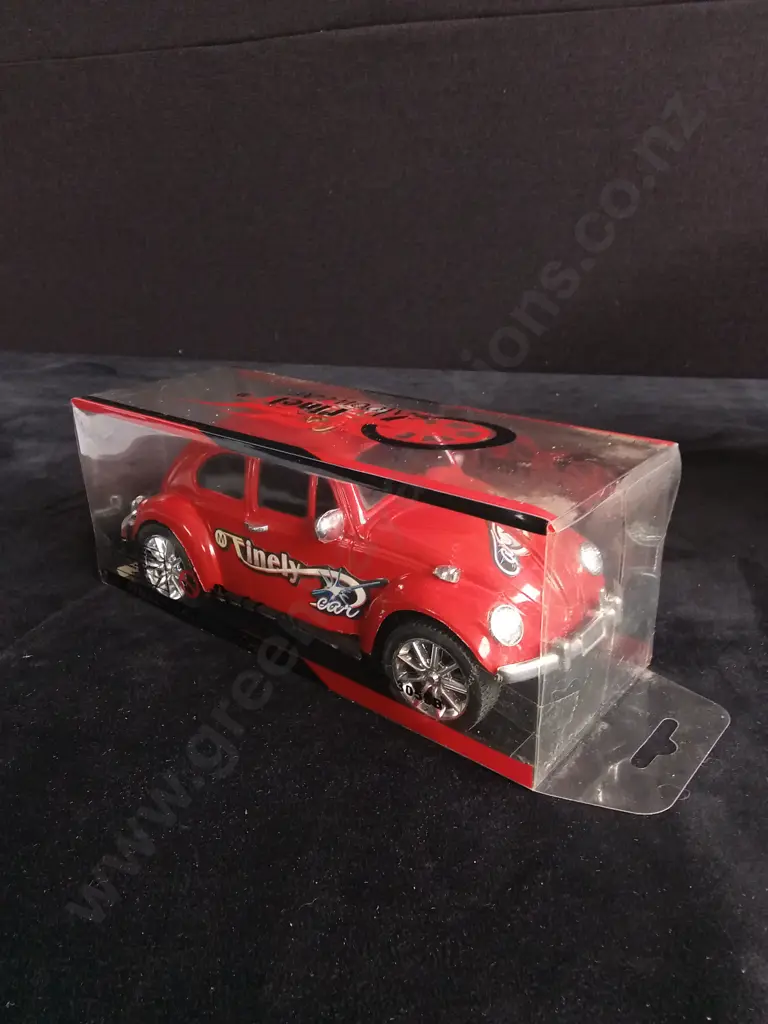 4 TOY CARS, PACKAGED Image 1++