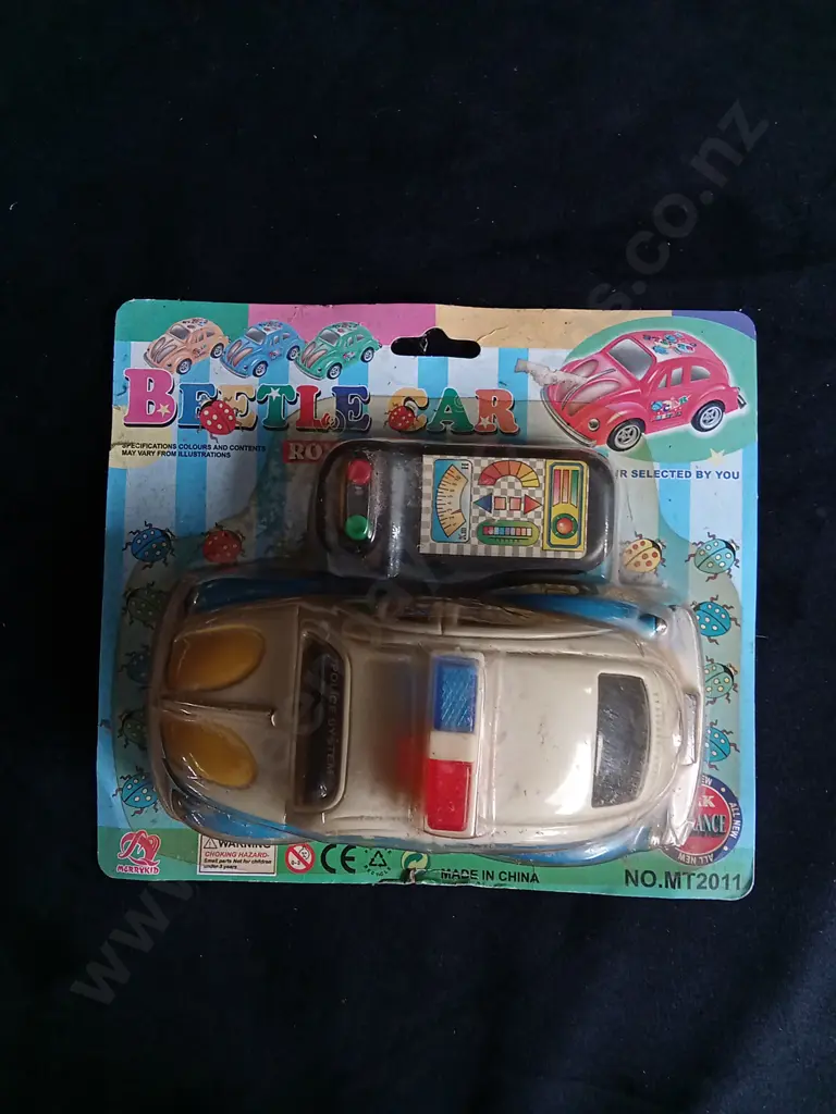 4 TOY CARS, PACKAGED Image 1++