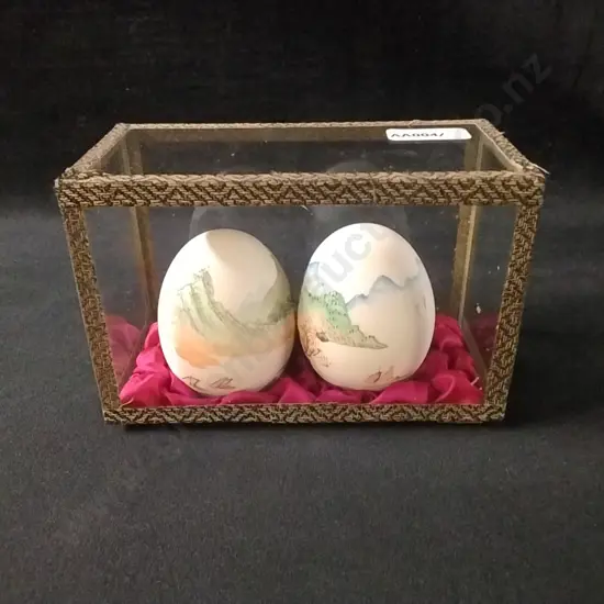 SMALL CASE WITH TWO FINELY PAINTED EGGS