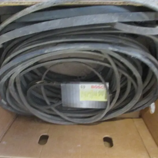 BOX OF VARIOUS MACHINE BELTS