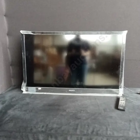 SONY BRAVIA TV WITH WALL MOUNT ATTACHED & WITH REMOTE