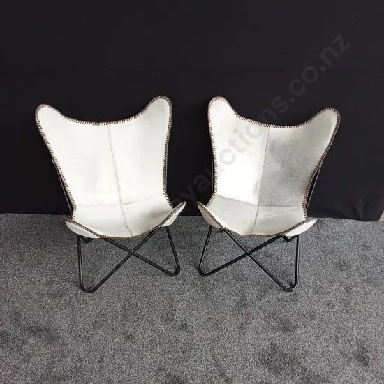 PAIR OF COW HIDE BUTTERFLY STYLE STEEL FRAMED CHAIRS