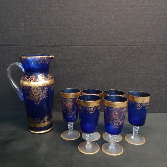 VINTAGE COBALT BLUE GLASS PITCHER AND 6 MATCHING GLASSES
