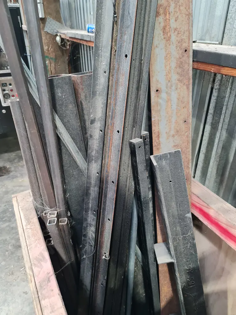 Wooden Bin with Assorted Metal Pieces Image 1++