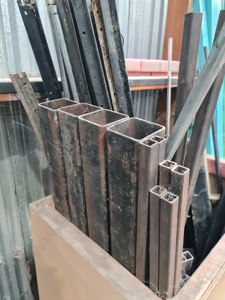 Wooden Bin with Assorted Metal Pieces Image 1++