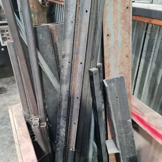 Wooden Bin with Assorted Metal Pieces