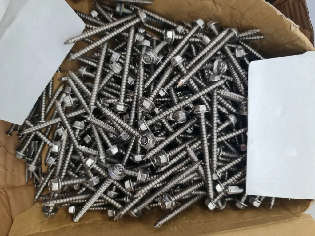 Assorted Stainless Steel Screws and Nails Image 1++