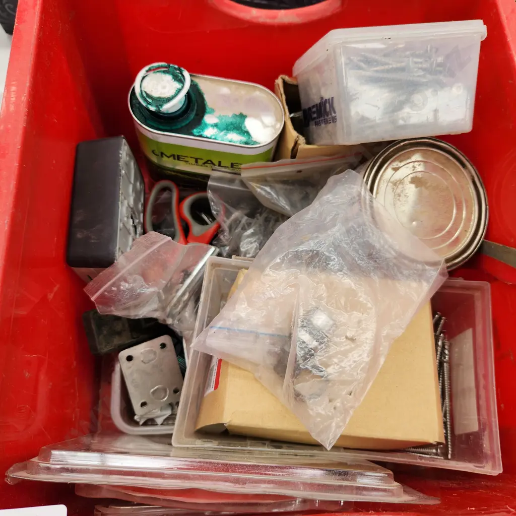Red Bin of assorted Building Materials Image 1++
