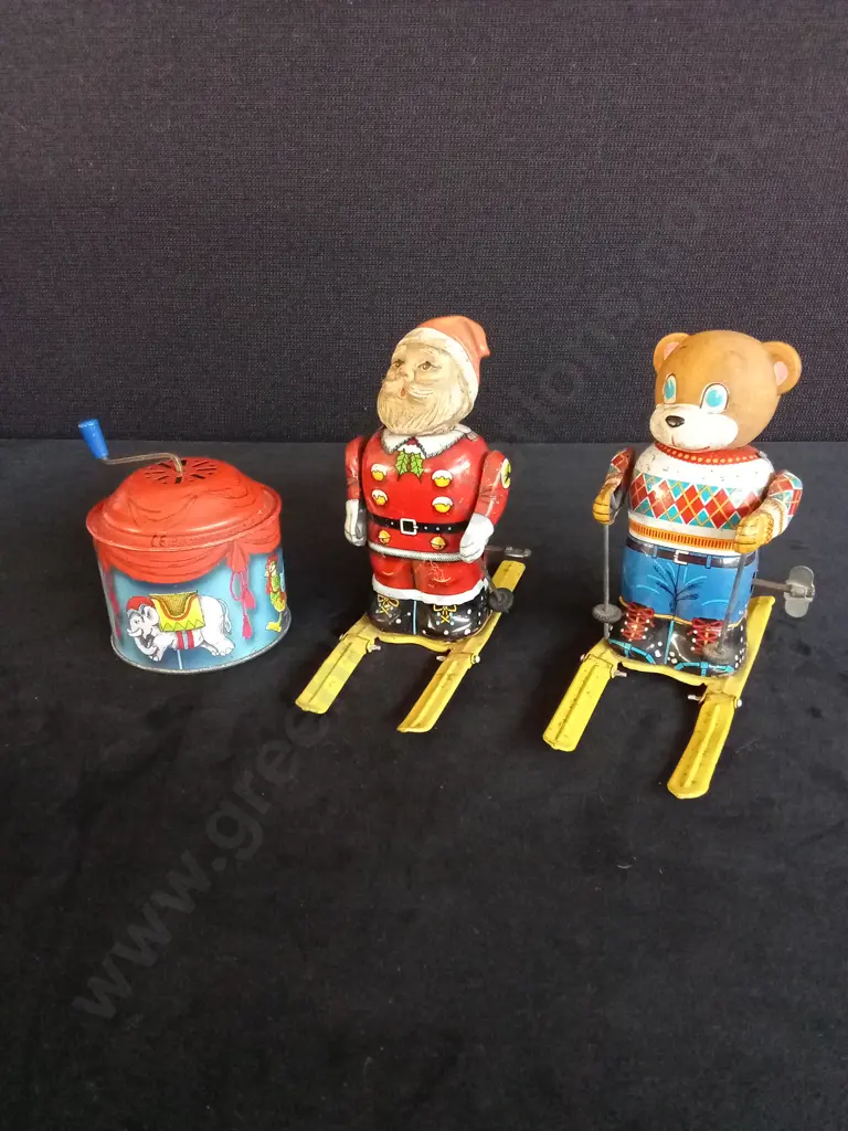 VINTAGE JAPANESE TIN WIND-UP TOYS SANTA CLAUS AND SKIER BEAR WITH A BOLZ CAROUSEL MUSIC BOX Image 1++