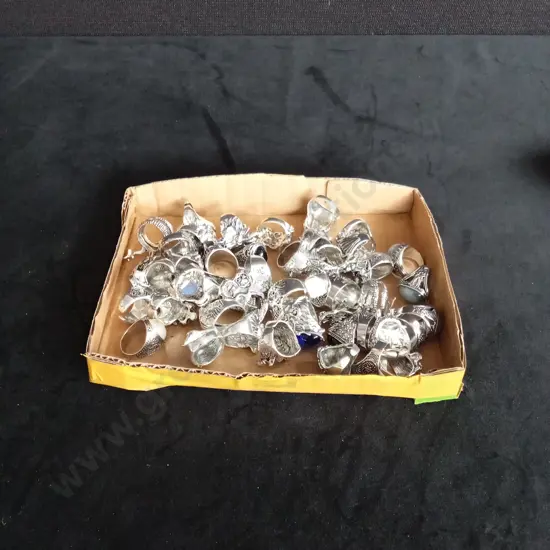 BOX OF ASSORTED SILVER RINGS