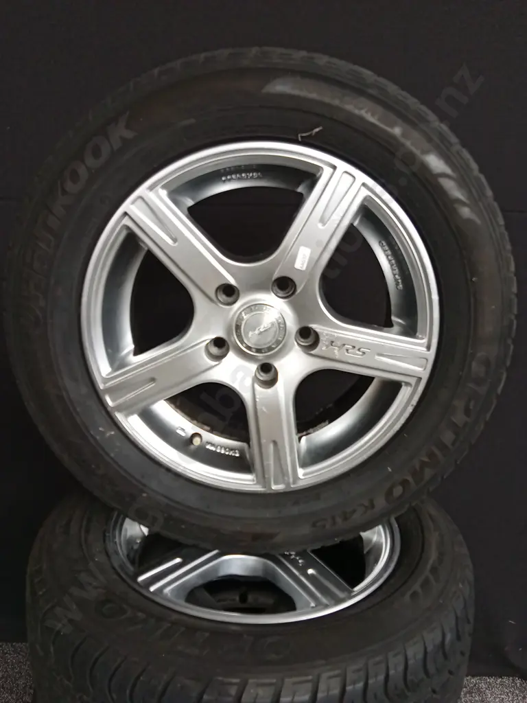 SET OF 4 HRS 15 INCH ALLOY WHEELS 15X6.5 JJ ET40 100 X 45H WITH HANKOOK OPTIMO 205/60 R15 TYRES OFF MAZDA 323 Image 1++
