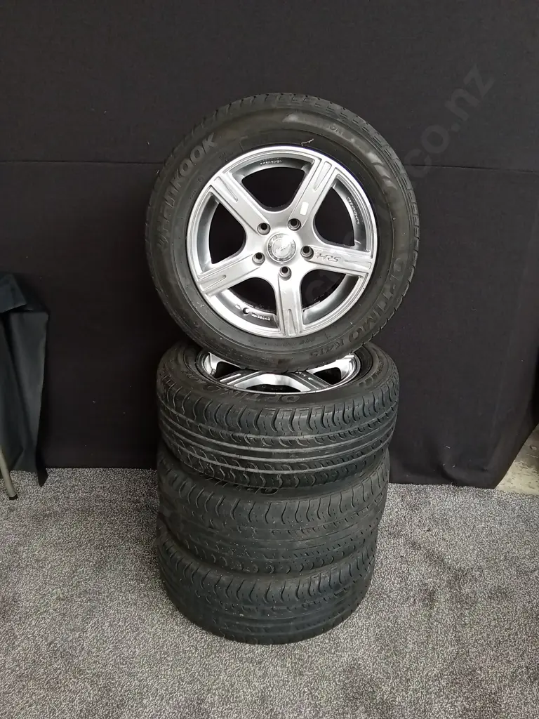 SET OF 4 HRS 15 INCH ALLOY WHEELS 15X6.5 JJ ET40 100 X 45H WITH HANKOOK OPTIMO 205/60 R15 TYRES OFF MAZDA 323 Image 1++