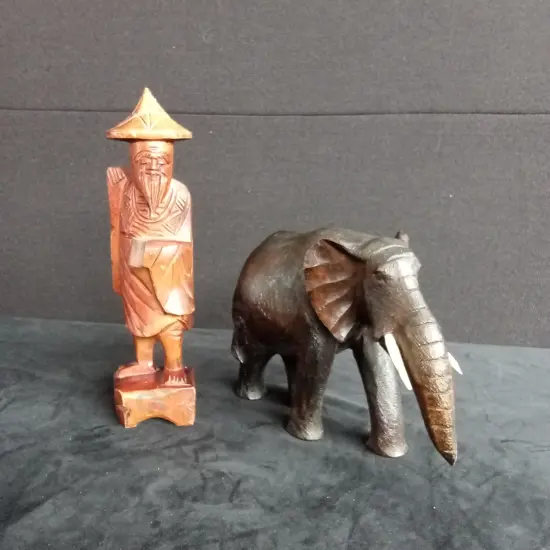 2 HAND-CARVED WOODEN FIGURINES