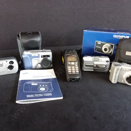 ASSORTED DIGITAL CAMERAS AND ACCESSORIES