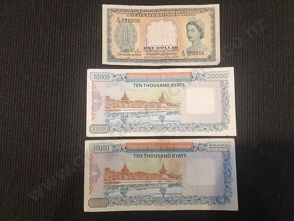 2 X MYNMAR 10000 KYAT BANK NOTES FROM 2012 SERIES PLUS 1 X 1953 MALAYA AND BRITISH BORNEO 1 DOLLAR NOTE Image 1++