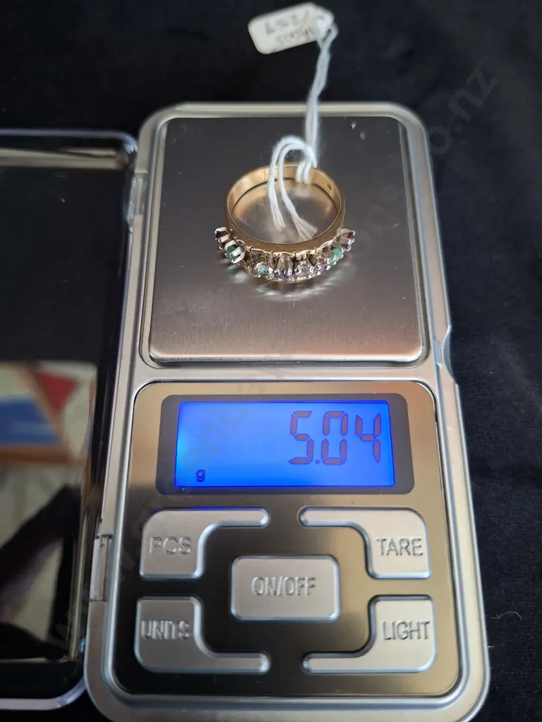 GOLD RING MARKED 10k WITH VARIOUS STONES INSET AND ONE STONE MISSING Image 1++