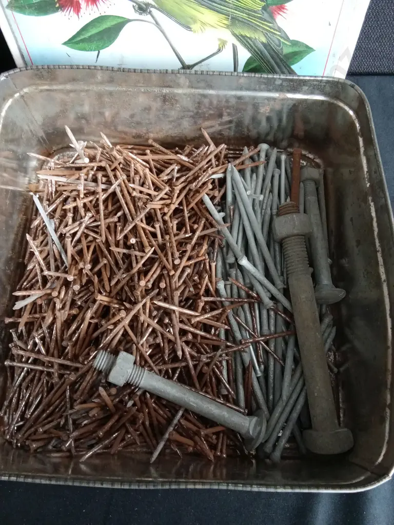 TWO BISCUIT TINS FULL OF NAILS Image 1++