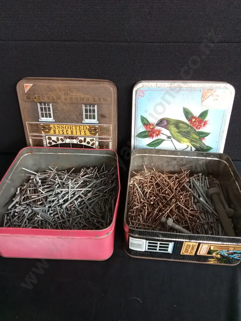 TWO BISCUIT TINS FULL OF NAILS Image 1++