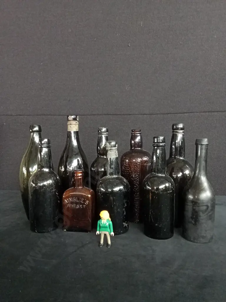 COLLECTION OF ANTIQUE GLASS BOTTLES X 10 AND A LITTLE WOMAN Image 1++