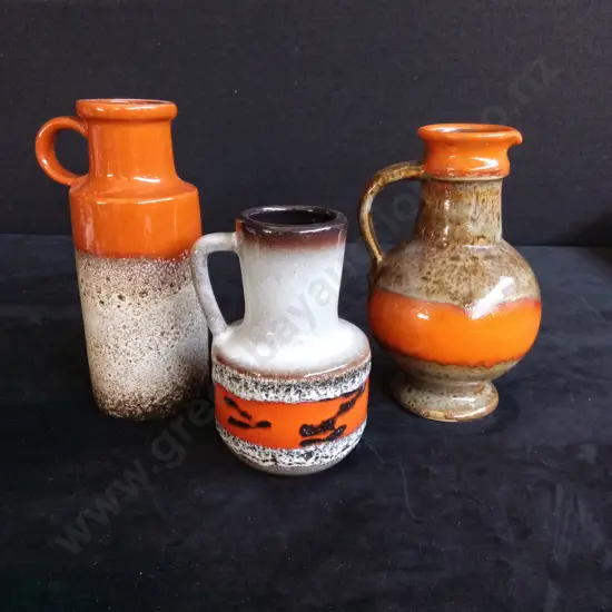 VINTAGE SET OF GERMAN POTTERY PITCHERS