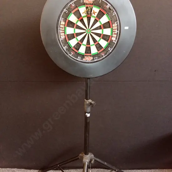SHOT OUTLAW DART BOARD ON FORMULA SPORTS TRIPOD WITH FOAM SURROUND ( ONE LEG DAMAGED - FOOT MISSING RUBBER) PLUS DARTS
