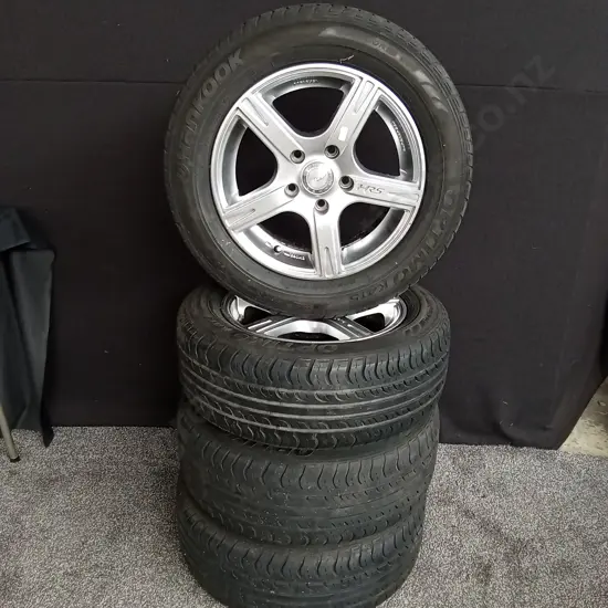 SET OF 4 HRS 15 INCH ALLOY WHEELS 15X6.5 JJ ET40 100 X 45H WITH HANKOOK OPTIMO 205/60 R15 TYRES OFF MAZDA 323