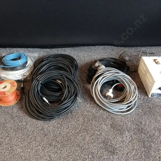 BOX CONTAINING 4X AUDIO EXTENSION LEADS. 2X POWER EXTENSION LEADS AND COAX CABLE PLUS STEP DOWN TRANSFORMER