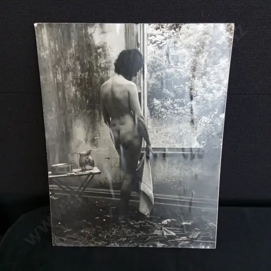 PHOTOGRAPH ON A BOARD