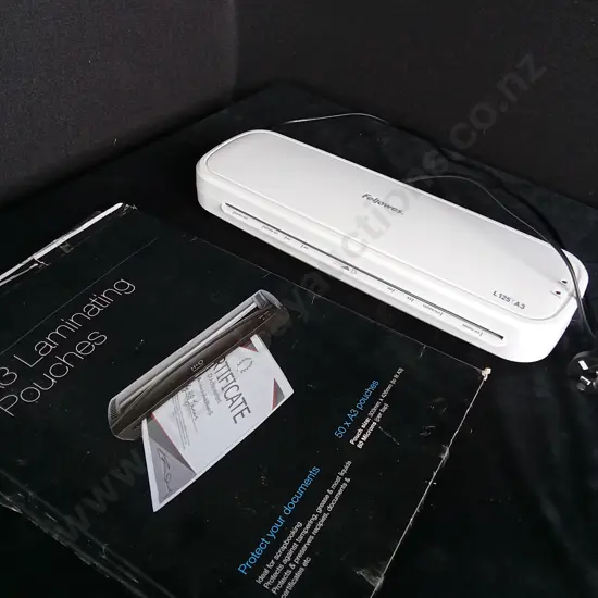 FELLOWES LAMINATOR AND SHEETS (WORKING)