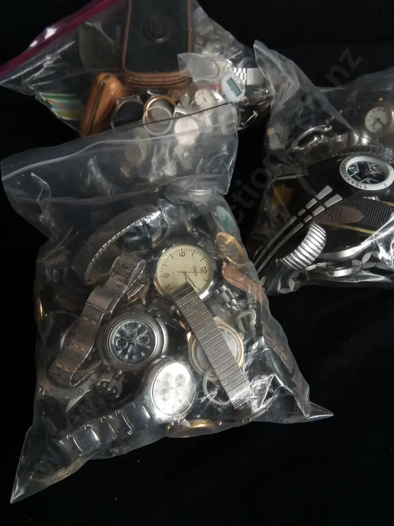 THREE BAGS OF ASSORTED WATCHES AND WATCH PARTS Image 1++
