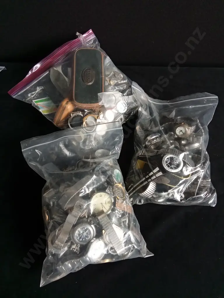 THREE BAGS OF ASSORTED WATCHES AND WATCH PARTS Image 1++