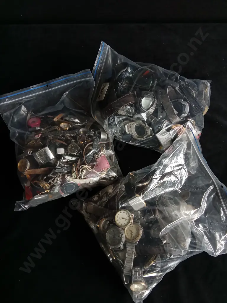 THREE BAGS OF ASSORTED WATCHES AND WATCH PARTS Image 1++