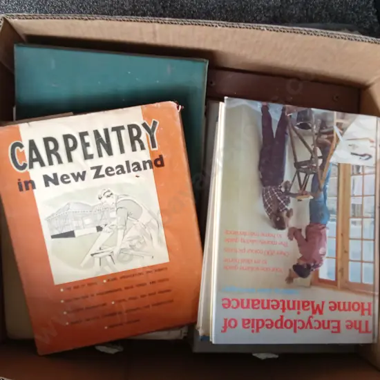 BOX OF BOOKS ON WOODWORK