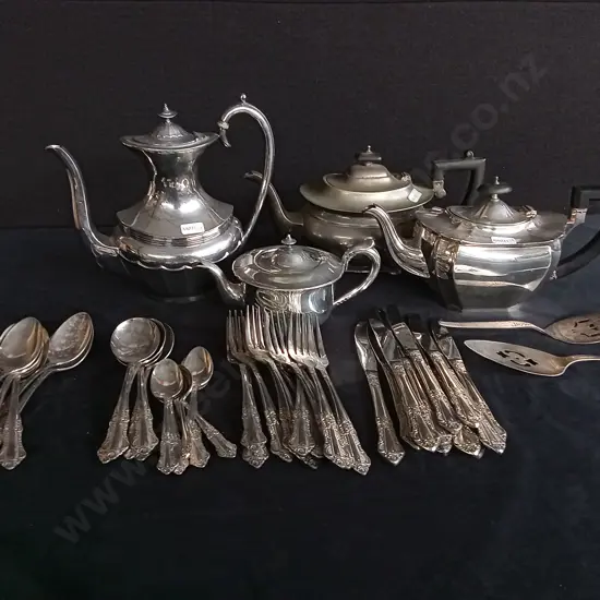 SET OF PLATED SILVERWARE