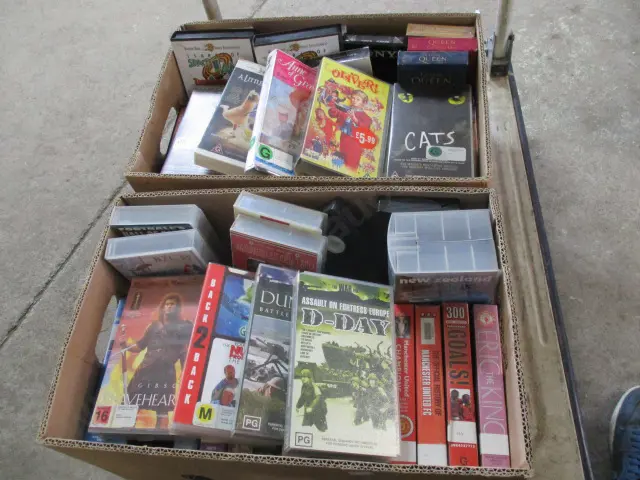 BOX OF ASSORTED VIDEOS Image 1++