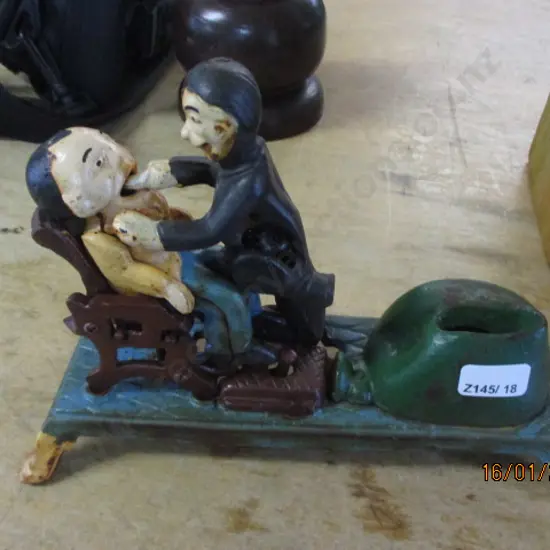Cast Iron Dentist Toy